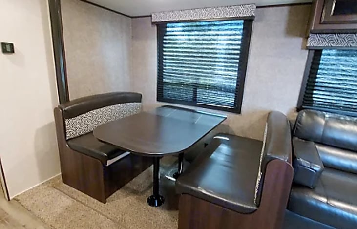 Kitchen table which collapses into a full size bed.