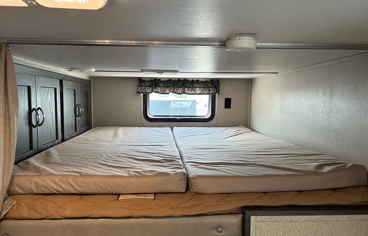 Top bunk. Bunks all include foam toppers for comfort.