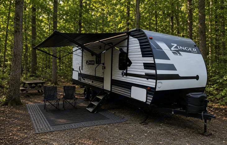 "Mountain Zinger" is a family-friendly bunkhouse travel trailer designed to maximize sleeping capacity and living space. This single-slide model features a highly functional floor plan.