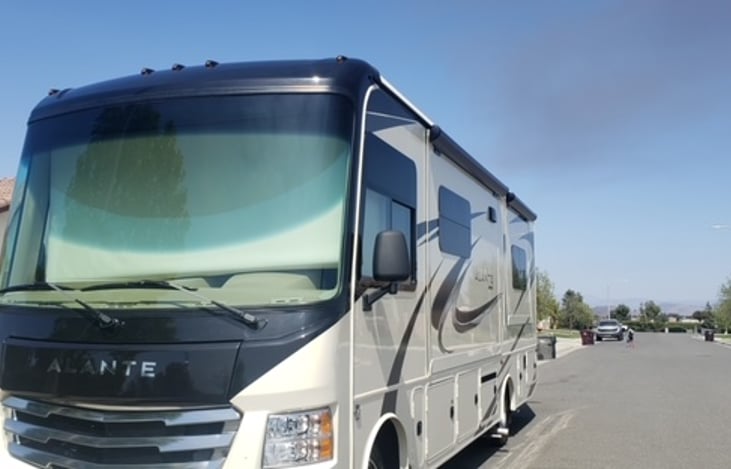 Two slide outs and an outside television with awning