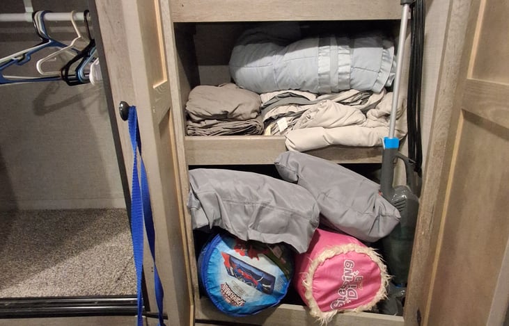 There is 2 kids sleeping bags and extra sheets.