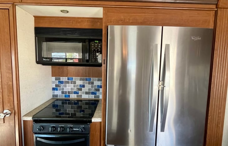 Stove, Microwave and Residential Size Refrigerator