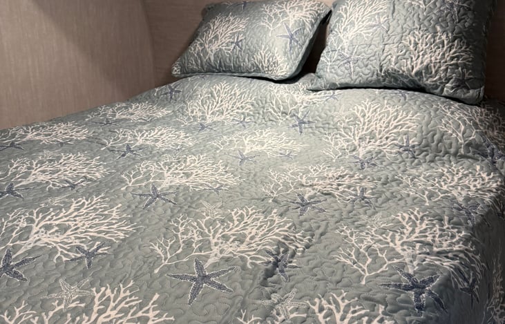 1 plated mattress on queen bed, plus two bunks , pull out couch with pillows, linens and blankets