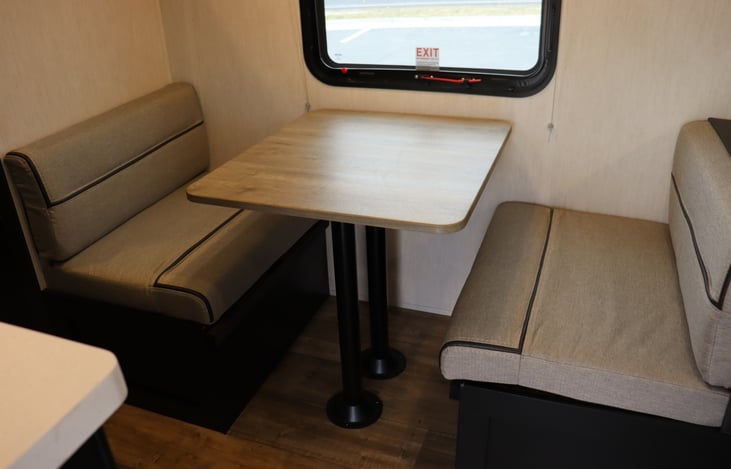 Dinette turns into 5th bed. (Cot width)