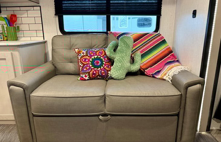 The jackknife sofa transitions into another sleeping arrangement. Linens provided!