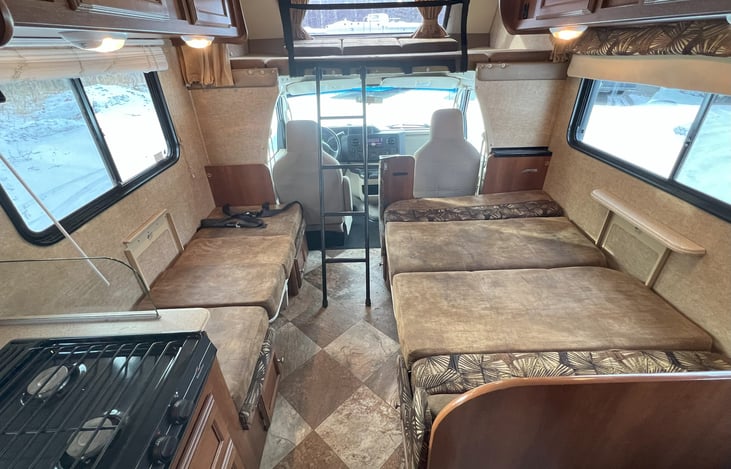 47" x 71" bed on right (closest in size to full/double bed, which is 54" x 75"); bed on left is 25" x 63" (closest to twin size, which is 38" x 75").