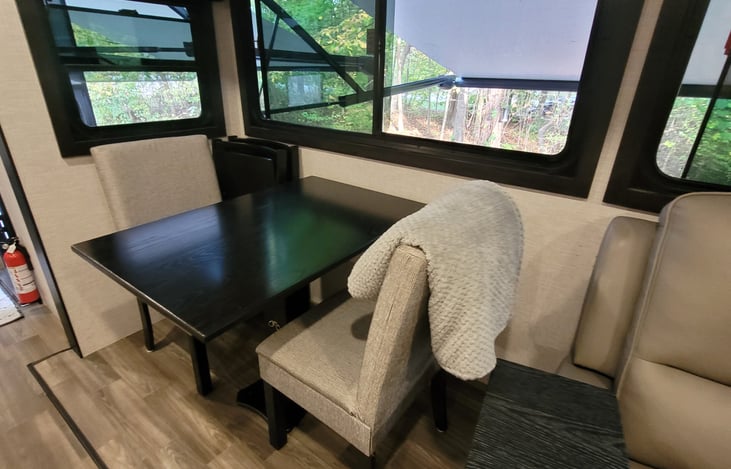 seating for 2 or 4 with the extra folding chairs at the dining table inside