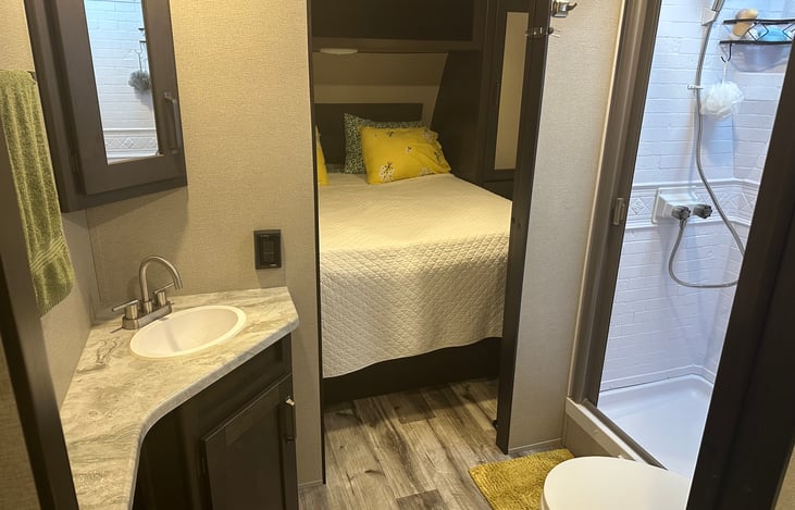 Main bathroom / shower leading to Master bed up front