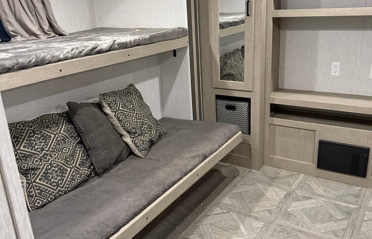 Back bedroom. On the left. Two bunk beds.