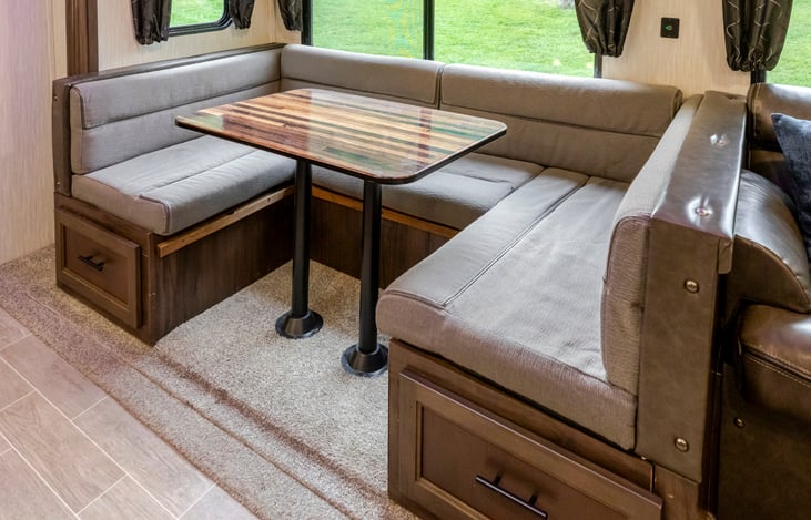 Dinette area, also folds down into a bed