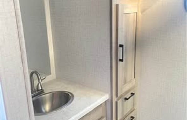 Vanity and closet space in the bathroom