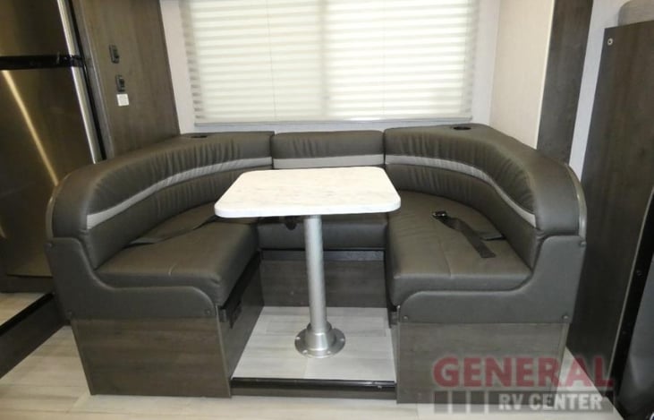 Interior: Living Area, Dinette - Collapses into a full + size bed