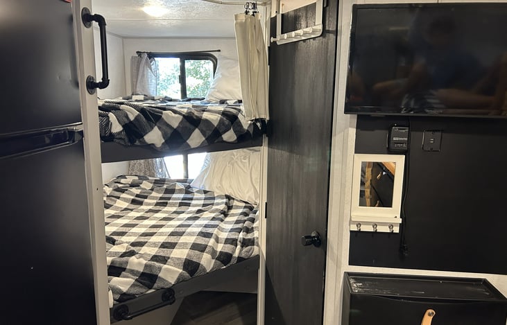 Bunks and door to the bathroom