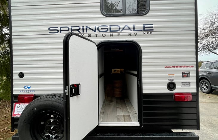 Outside door open to large storage area.