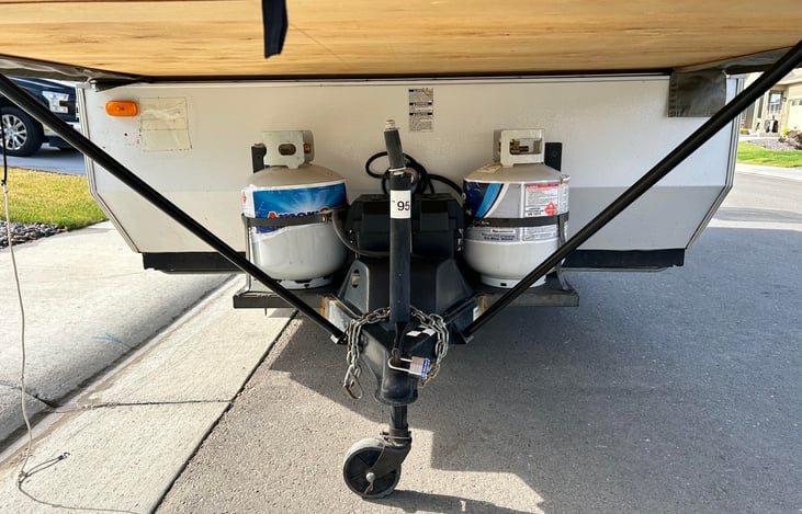 2-15 Gallon Propane tanks and a battery