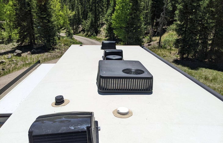 Max air vents to keep the rain out but allow ventilation. Walkable roof.