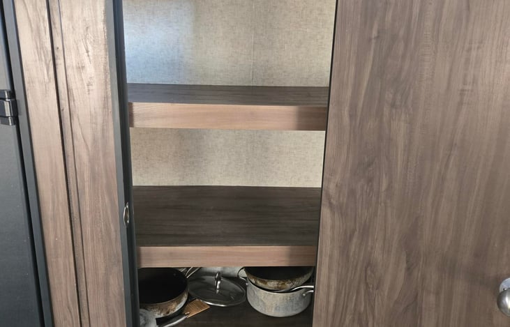 Pantry with pots and pans