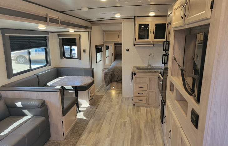 View from the entryway near the bathroom. Both the bathroom and bedroom have sliding doors (pictured in other photos)