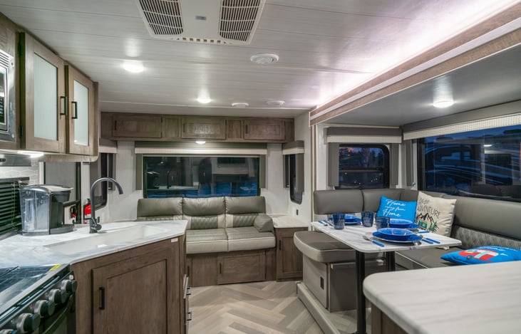 Couch and table convert into beds. Sleeps two on each.