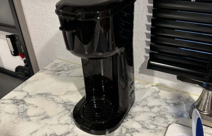 Coffee maker brews 4 to 10 ounces. Use either K-pods, or you can use your own ground coffee.