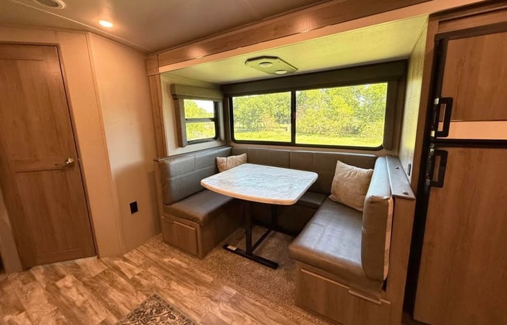 Large dinette that converts to a bed.