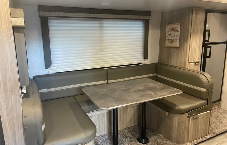 Large dinette converts to a double bed. Extra thick memory foam padding is stored under the seats to make this a cozy bed.