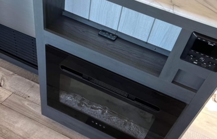 And a cozy electric fireplace to keep warm on those cool nights.