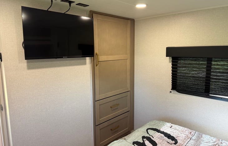 Master bed tv closet