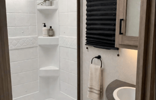 Sporty Little Giant Keystone RV Passport sleeps 7