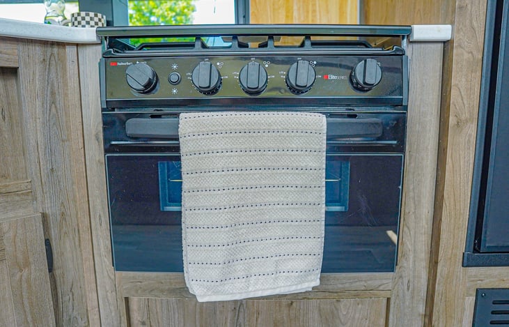 Rags provided and cleaned after every trip. That oven doubles as an air fryer too! Stovetop works wonderfully as well.