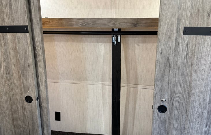 Giant closet with washer and dryer.