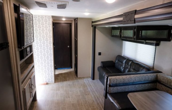 Standing in the kitchen area looking to the bunk room.