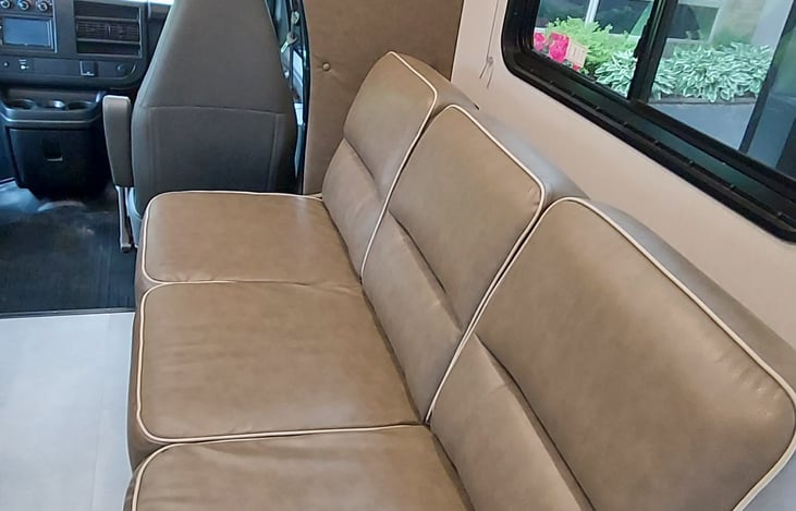 Couch that folds down into a bed. Also has 3 seatbelts