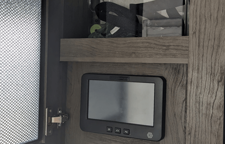 Storage area above control panel