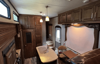 Spacious 2016 Keystone Cougar 326RDS