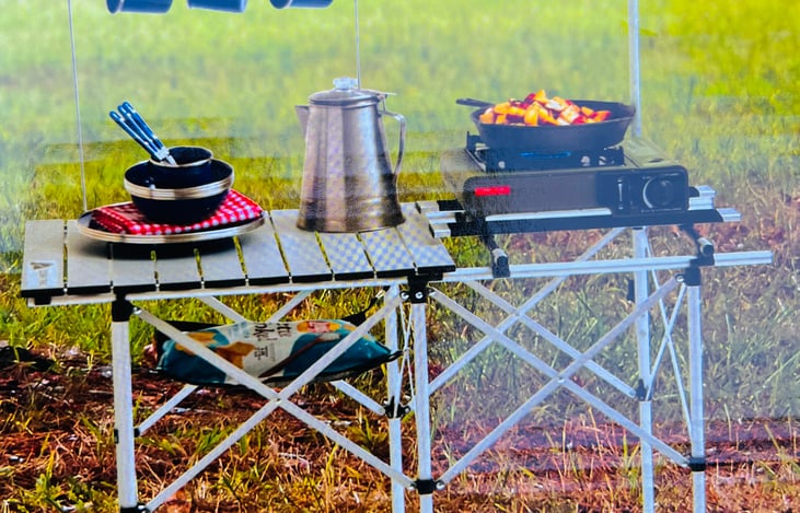 Outdoor folding cook table included for your convenience.