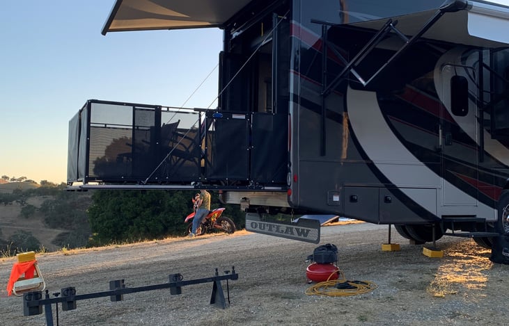 Deck with screen doors and awning