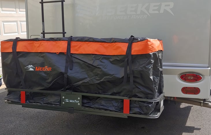 Waterproof carrier. Holds lots of stuff!