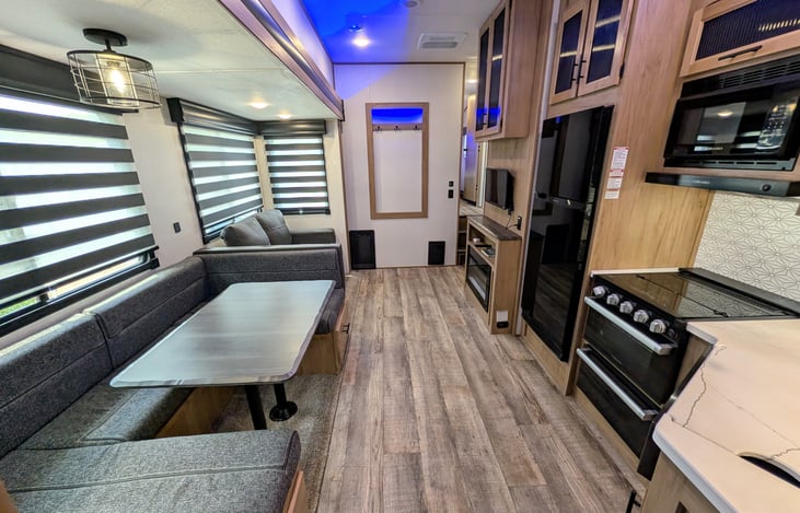 This impressive Cherokee Arctic Wolf 287BH Limited is spacious and loaded with comfortable features. Sleeps up to 10. Two bedrooms with separate bunkroom. Outdoor kitchen, solar and much more.