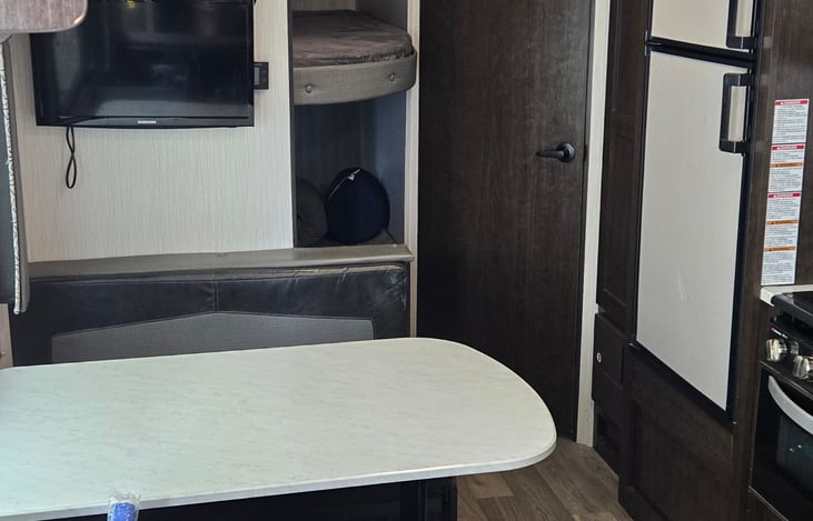 Two spacious bunks in the back, dinette converts to a bed
