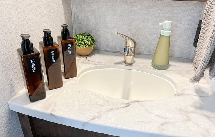 Soap, shampoo, and conditioner are provided.