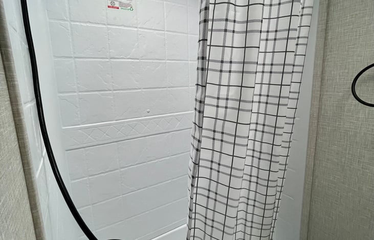 Tub/shower combo with sky light! Instant hot water tank.