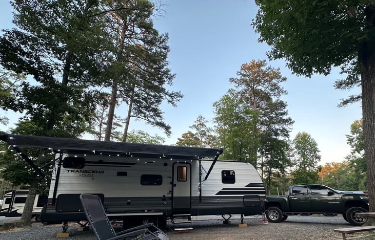 Exterior with awning and cozy lights...