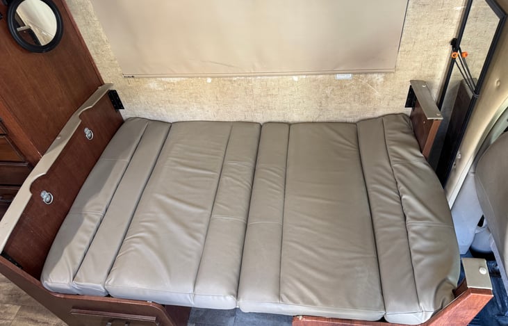 Table converts to bed (3)
Cushions are placed back on top of table.