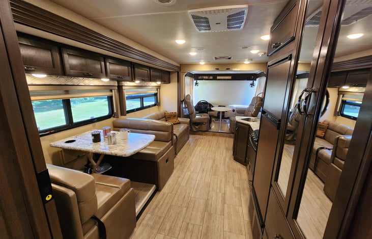 open floor plan with full dining and couch slide-out