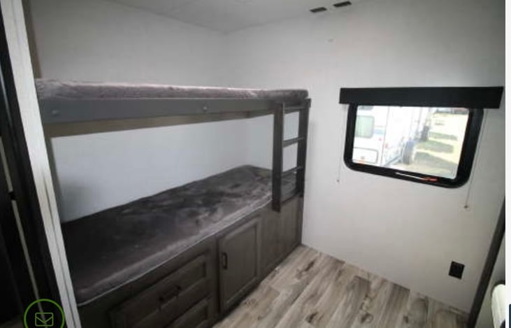 RV size bunk beds (slightly smaller than twin) in the 2nd bedroom with tv. Sheets, blanket and pillows provided.