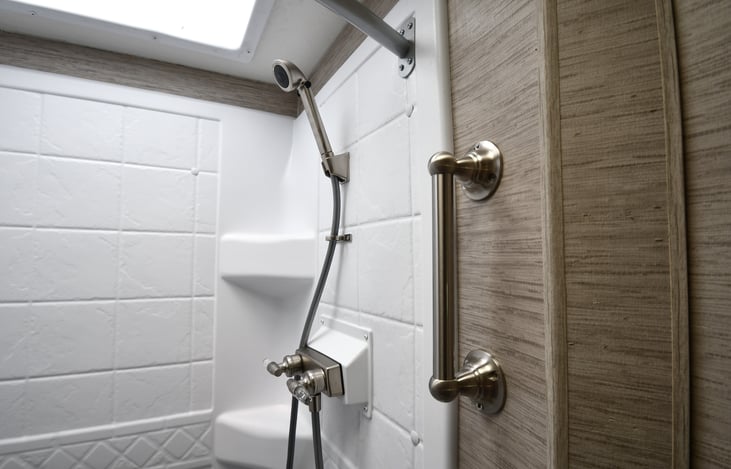 Added shower grab bar for stepping up/down