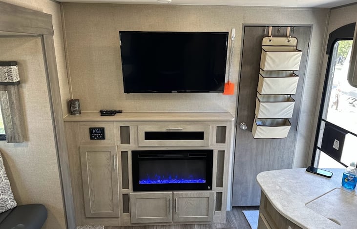 Living area TV and fireplace