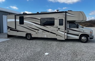 Max Mileage, Off Grid Solar, sleeps 8, 2 slides;