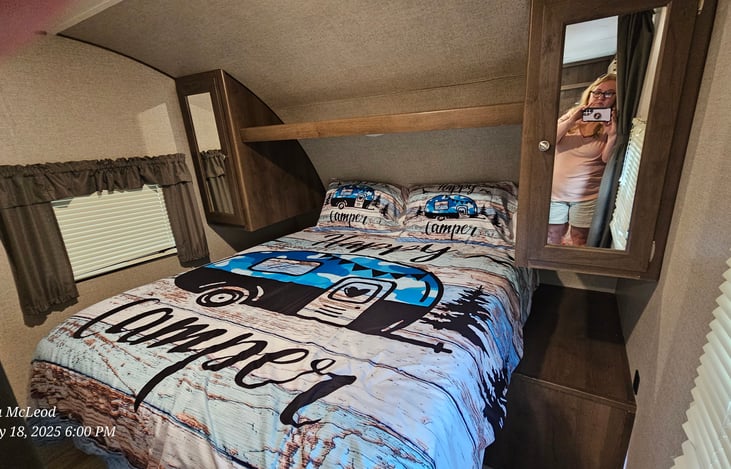 Queen bed with closets on either side! One side has USB ports and regular plugs and the other side of the bed has regular plugs. If you have a CPAP there is a place to plug it in!